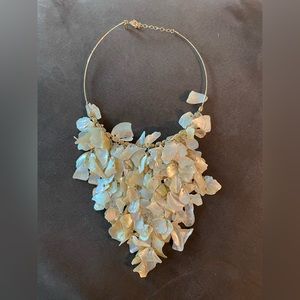 Kiam Family statement necklace. Mother of Pearl shell pieces and gold chain